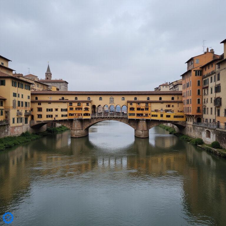 Widok na most Ponte Vecchio o wschodzie słońca nad rzeką Arno we Florencji
